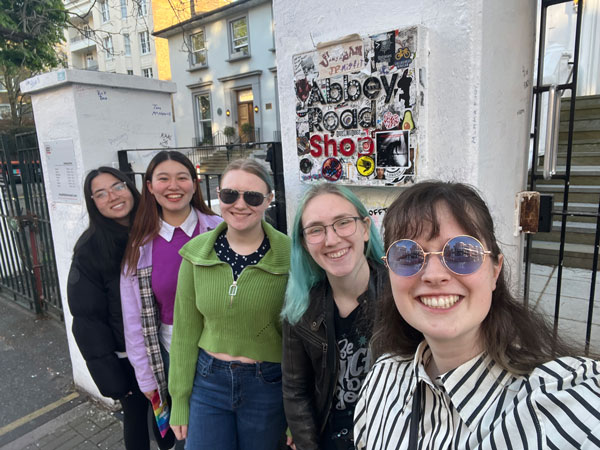 Selfie of study abroad students at Abbey Road Shop