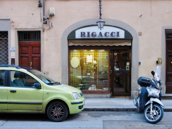 A storefront with a sign reading