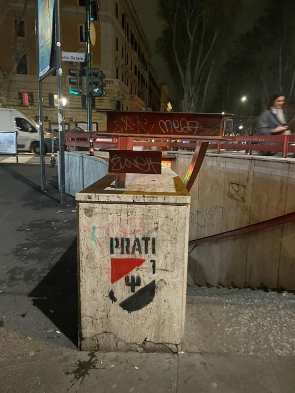 A concrete box with graffiti on it