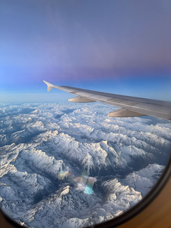 A view of the mountains from an airplane window