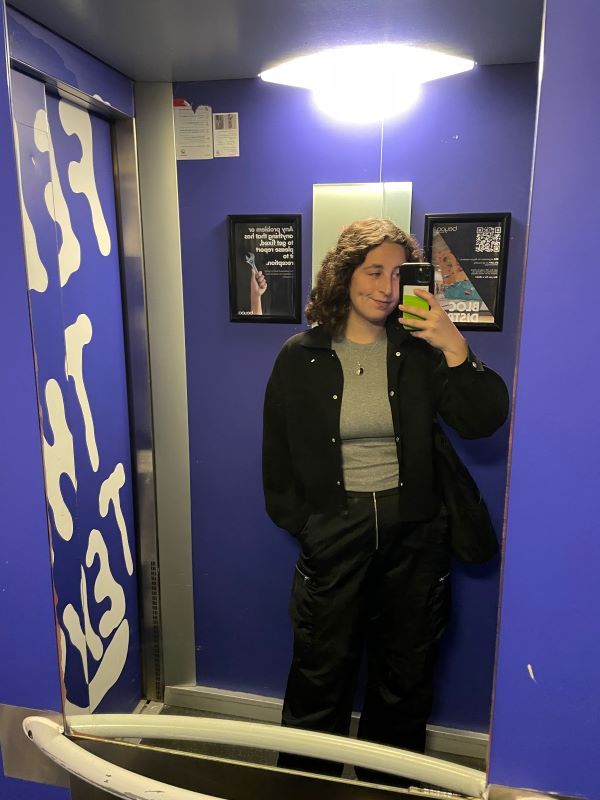 Mirror selfie of study abroad student in elevator