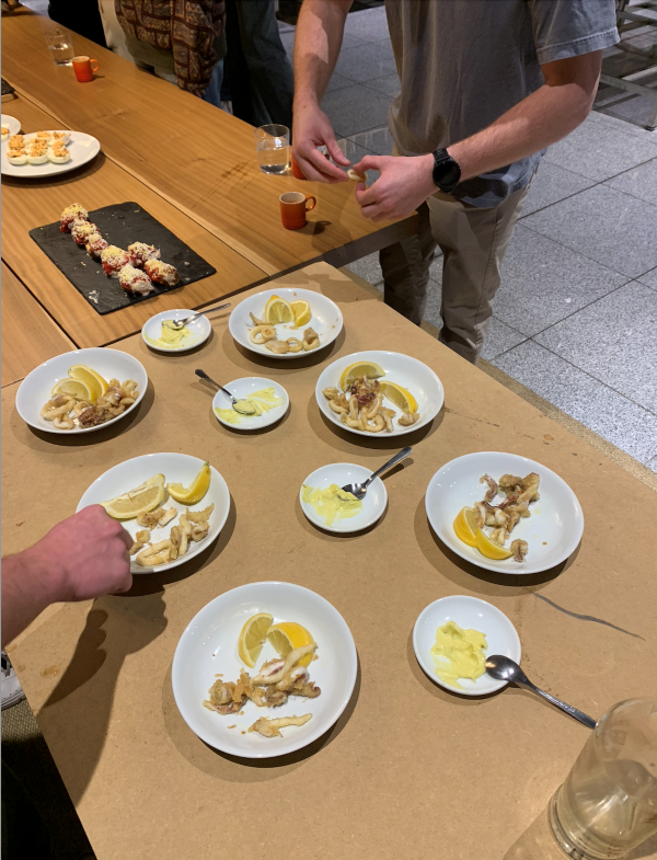 Photo from cooking class of people making tapas
