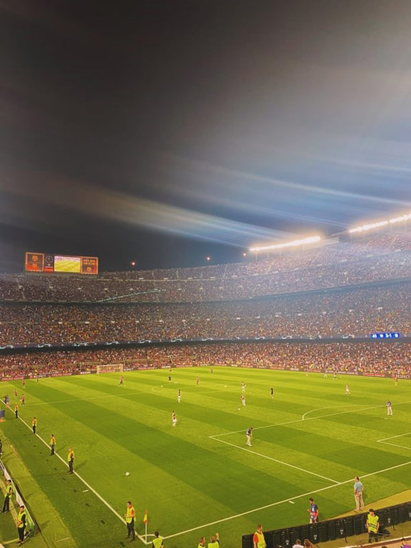 A stadium full of people playing football