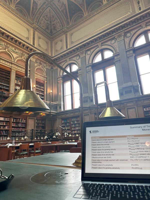 Open laptop on table inside the Budapest Library