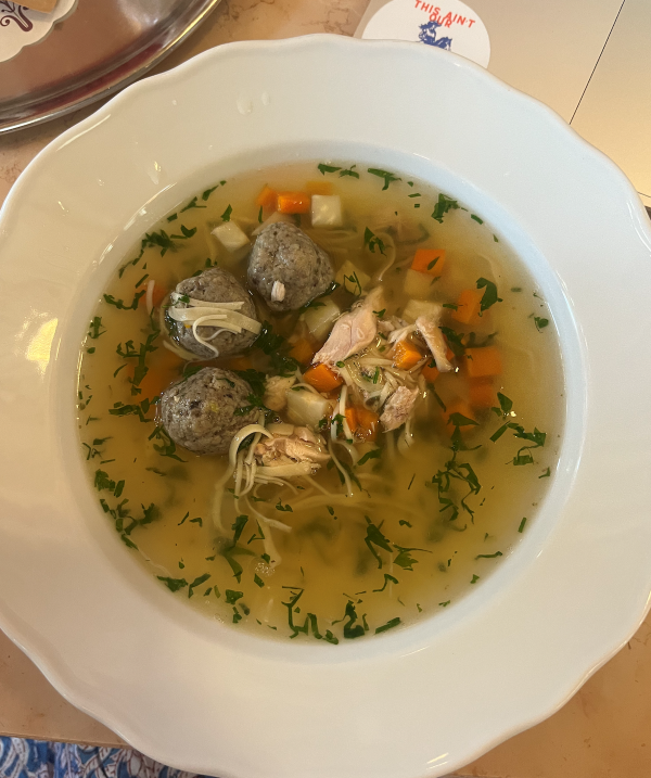 Chicken and meatball soup in bowl