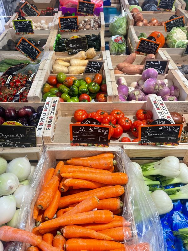 Market with a wide variety of vegetables on display