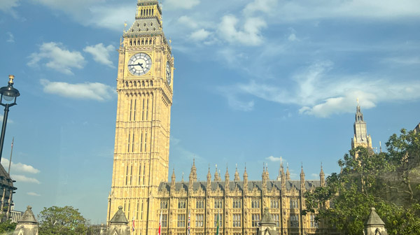 A clock tower in front of Big Ben