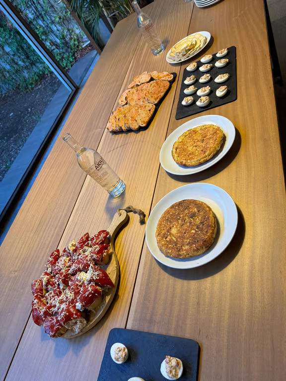 Table full of plated tapas