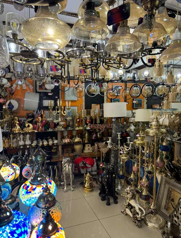 A room with many lamps and other objects