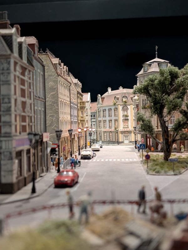A city street made out of miniature toys seen from eye level
