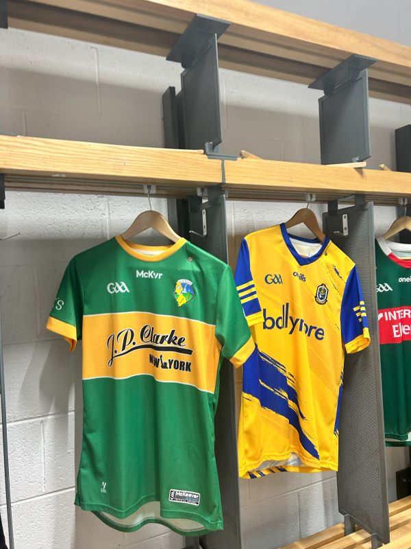 Image of soccer jerseys hung in locker room