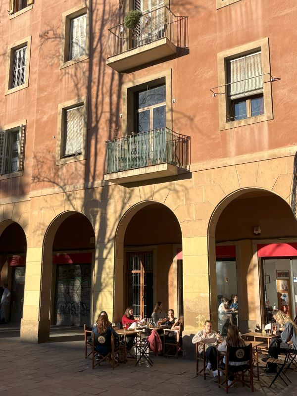 Students mingling in patio area 