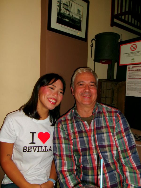 A study abroad student wearing a shirt that says