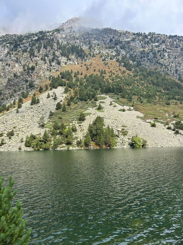 Body of water and pyrenees mountain