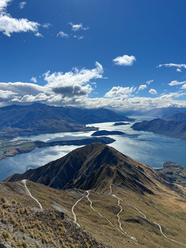 Photo taken from Roy's Peak overlooking mountains and lake