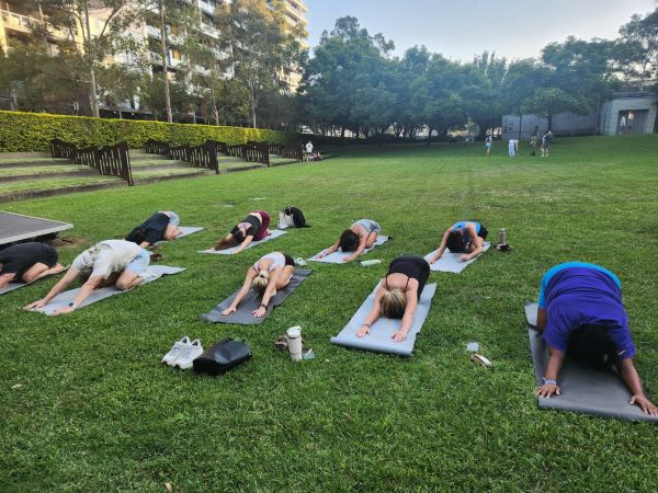 Study abroad students participating in yoga
