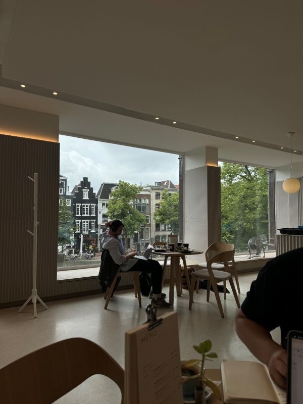 Retro cafe interior with window view of city