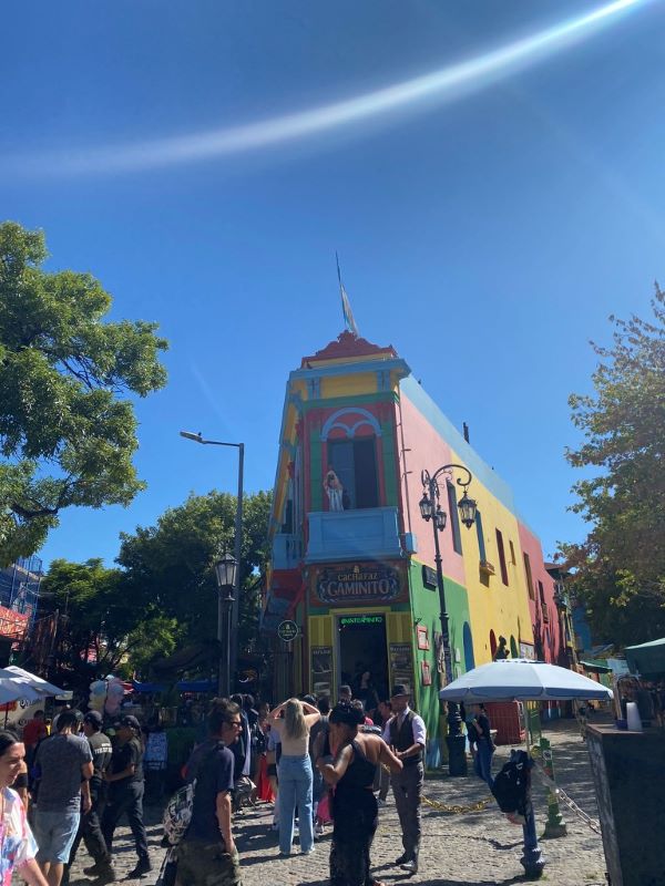 Crowded street with colorful building