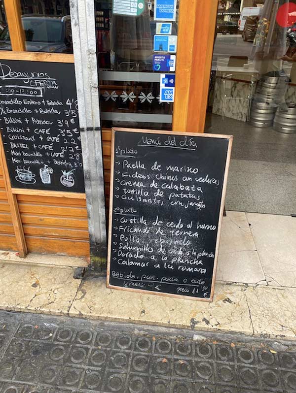 A chalkboard with writing on it