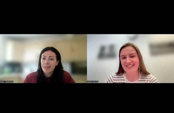 A screenshot of an online meeting between two people, split into separate screens and both smiling at the camera