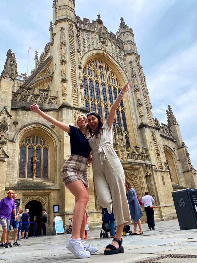 Photo of my friend and I standing in front of a cathedral