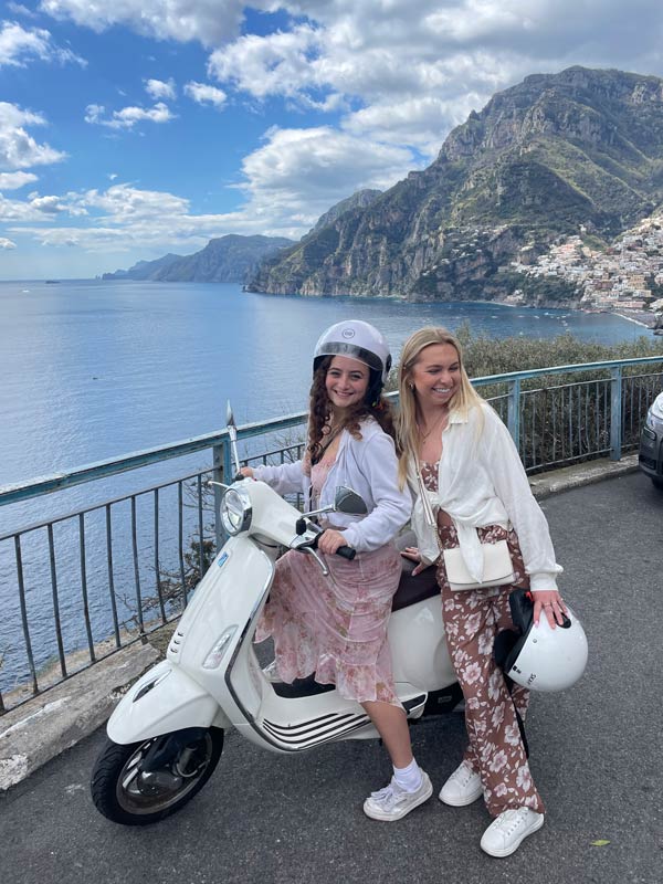 Two study abroad students on a scooter