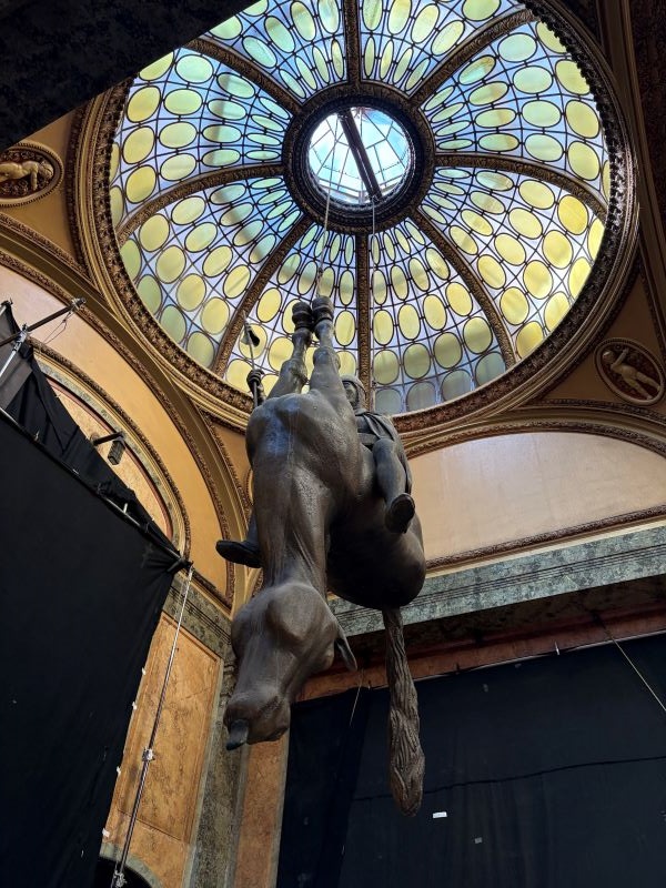 Statue of soldier riding horse upside down