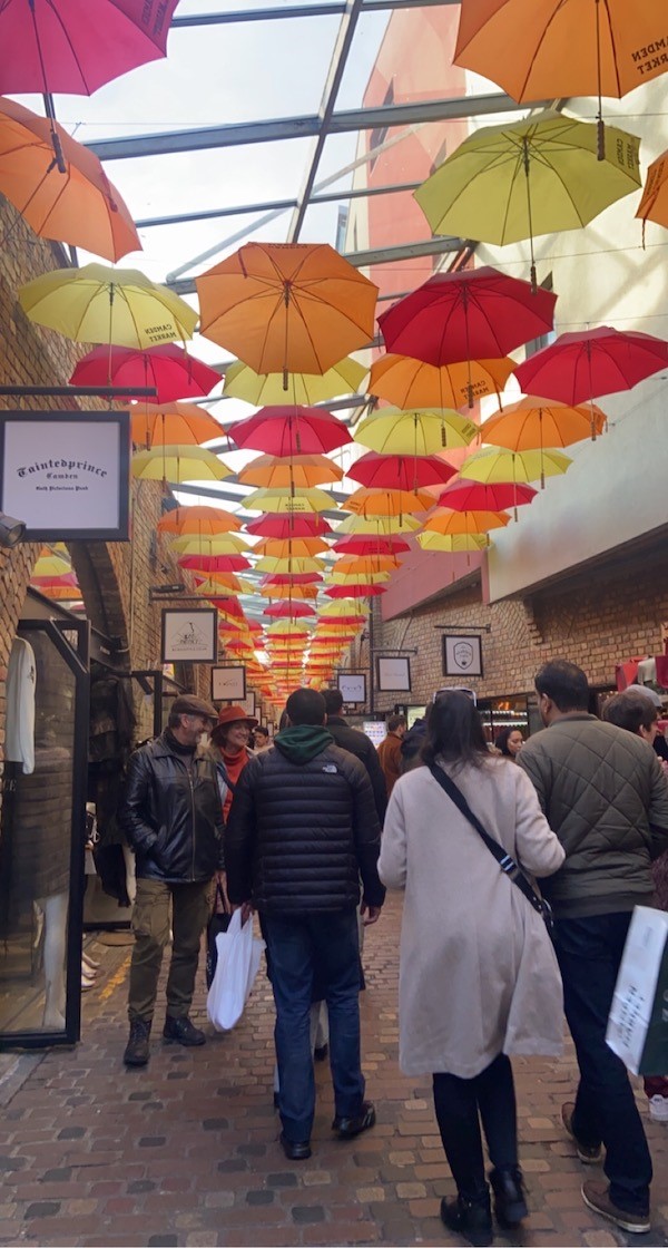 street with orange, yellow and red umbrellas