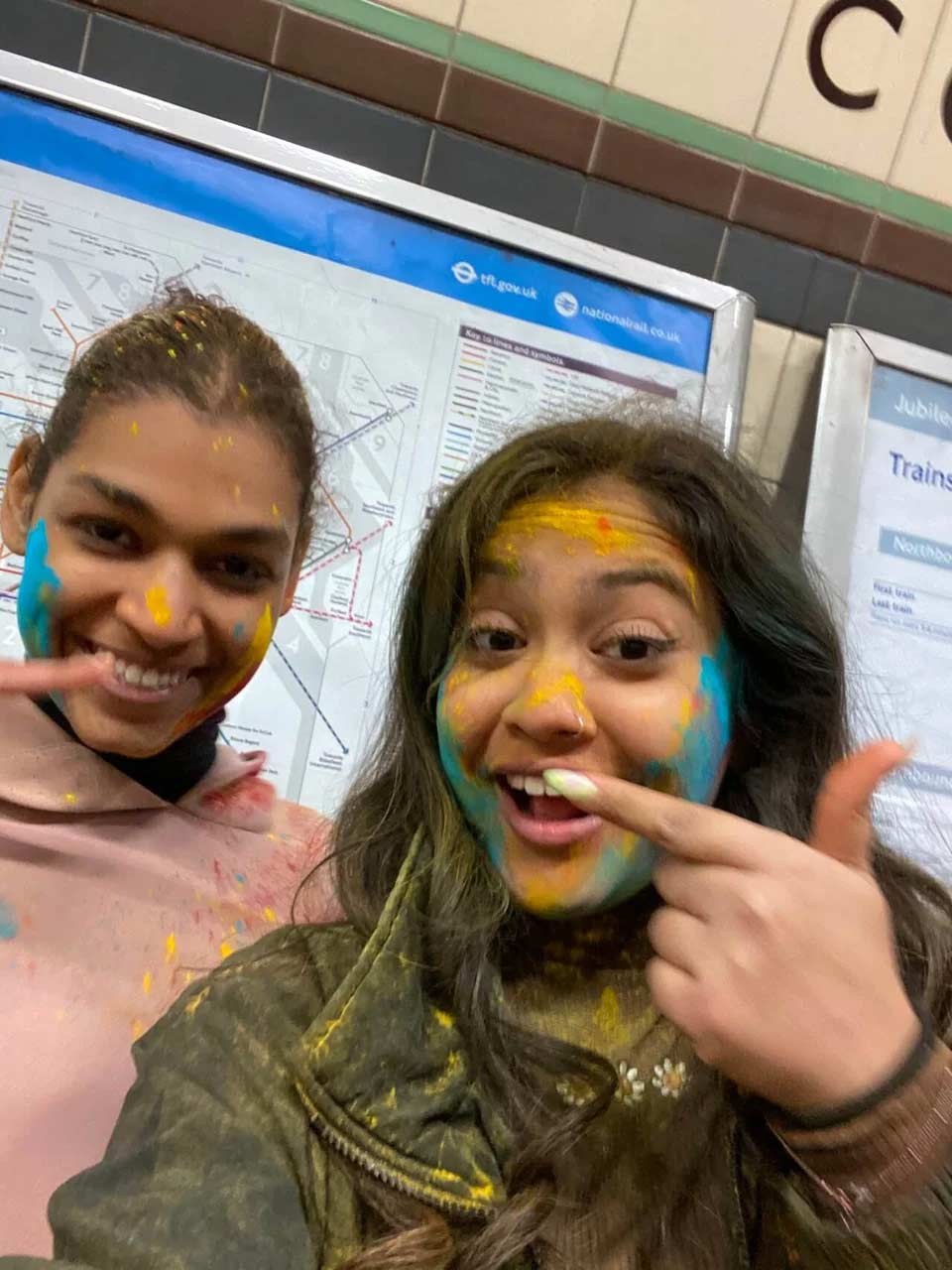 At the Tube station after the Holi Festival at Primrose Hill in London