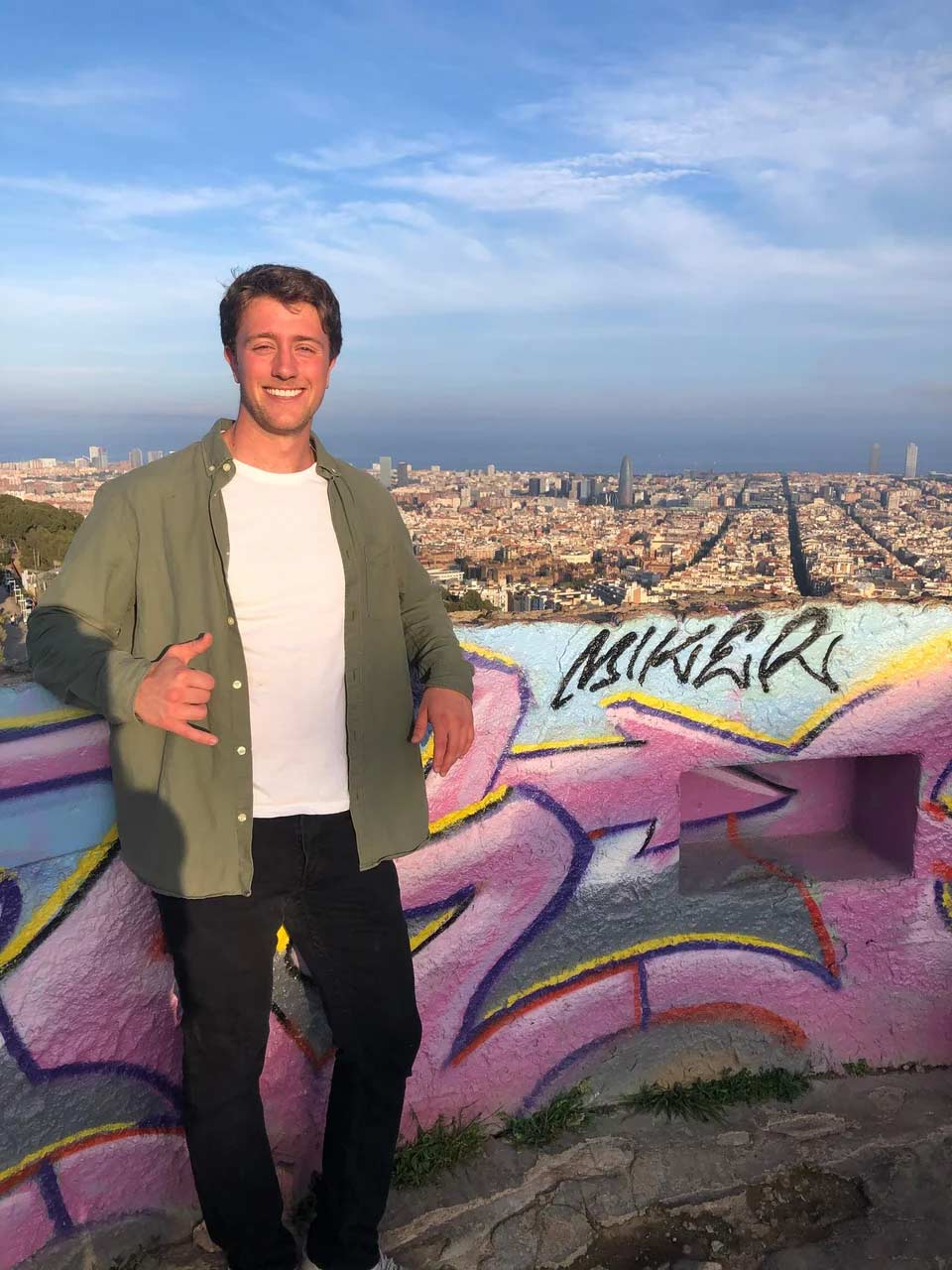 StudyAbroad_Spring2021_Barcelona_Andy_McKenzie_Andy_with_Barcelonas_cityscape_in_the_back