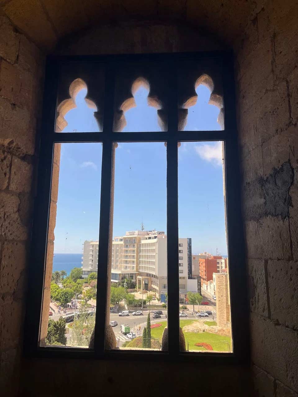 a view of a casino in Tarragona through a window