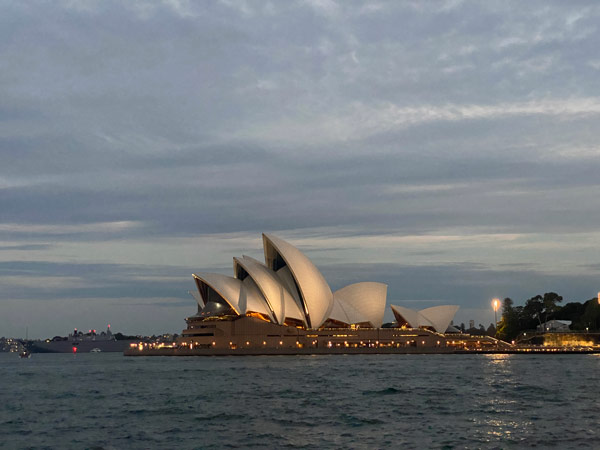 Photo of Circular Quay with the Sydney Opera House during sunset.