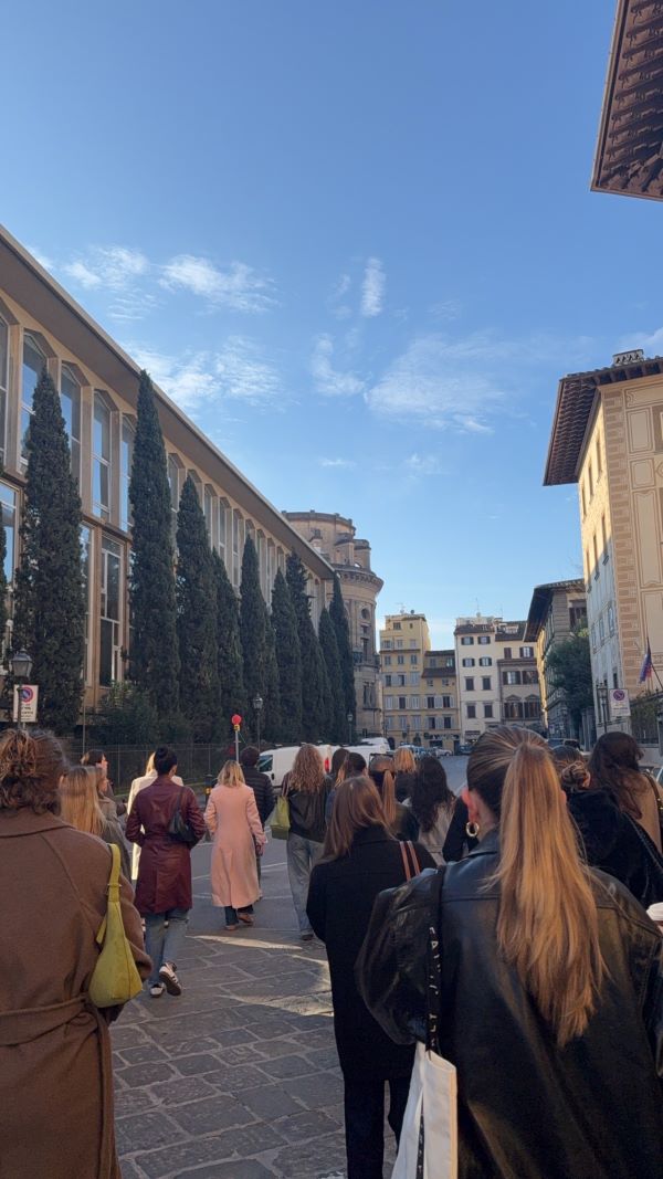 Study abroad students walking through the streets of Florence