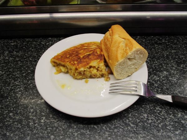 Plated tortilla with bread