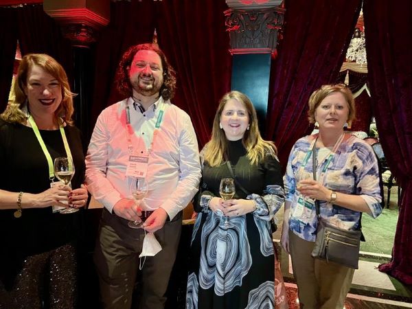 Study abroad professionals posing for photo at event