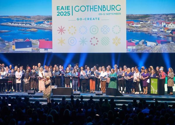 EAIE choir singing on stage