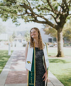 A person wearing a graduation gown